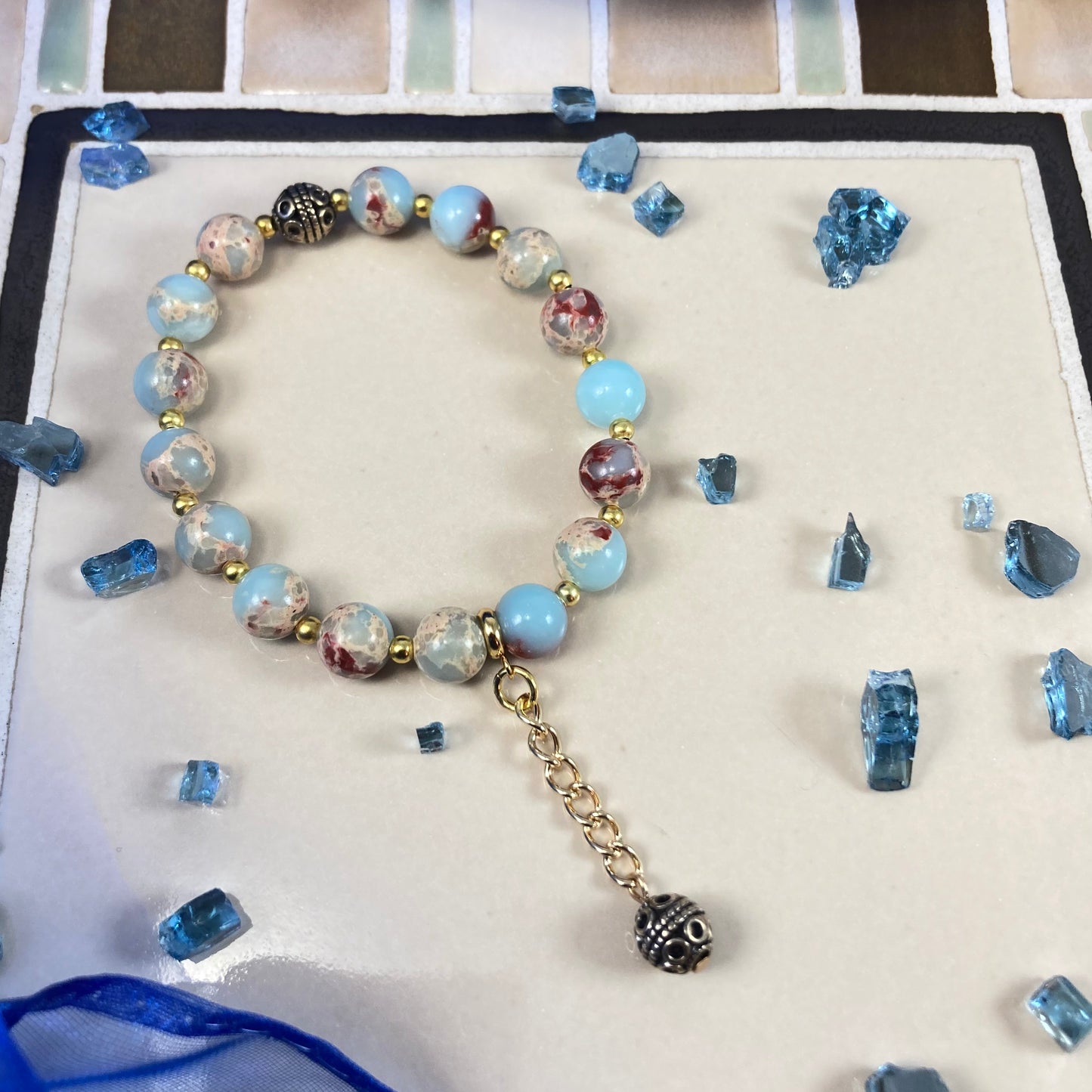 B24-01 - Blue & Gold Stretch Bracelet with Dangle