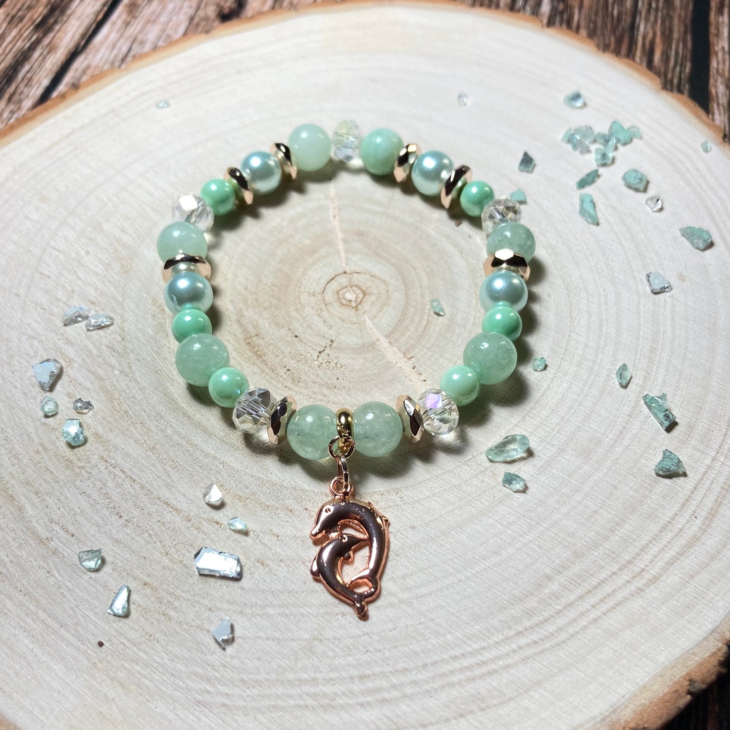 B24-46 - Sea Green Stretch Bracelet w/ Dolphin Charm