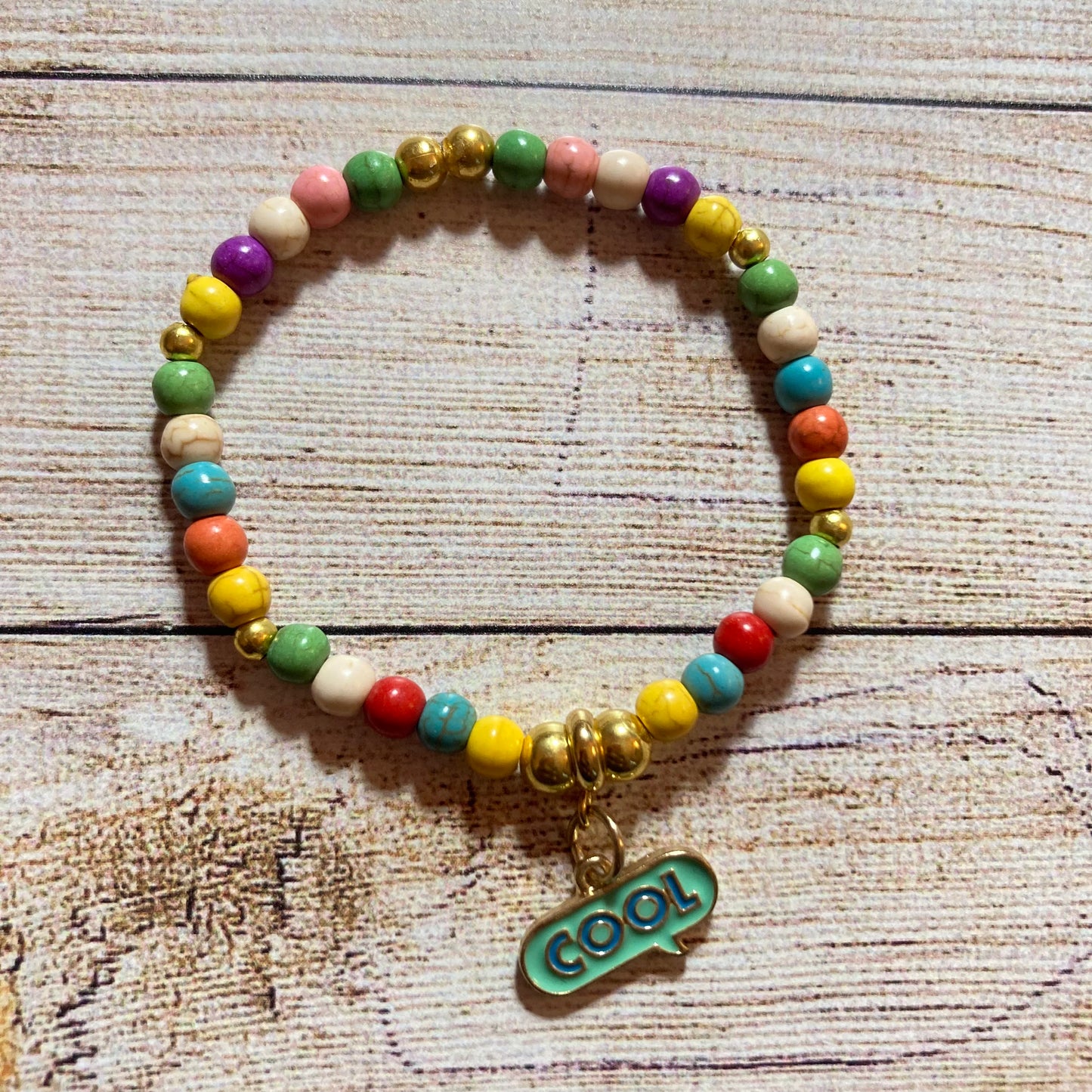 B24-GB6 - Colorful Stretch Bracelet w/ Cool Charm