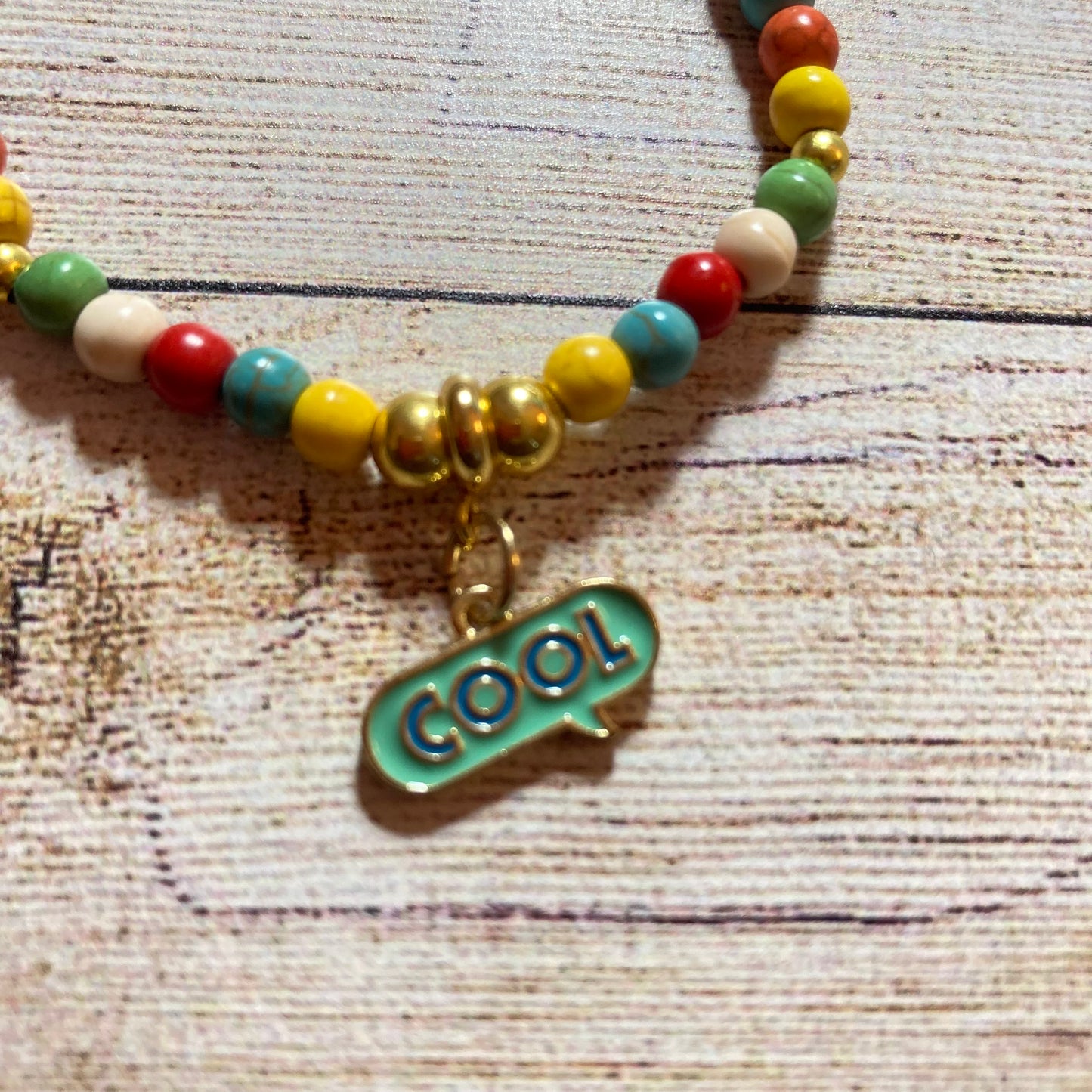 B24-GB6 - Colorful Stretch Bracelet w/ Cool Charm