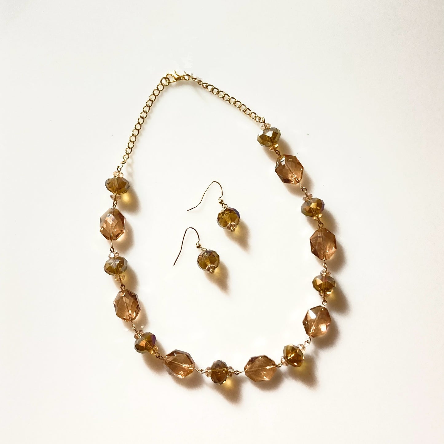 NS24-F22 - Amber Glass Faceted Oval Necklace & Earring Set