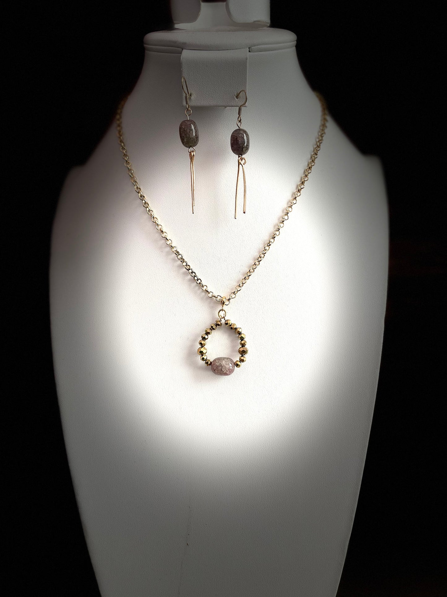 25 N-S15 Gold-tone faceted pendant necklace and earrings