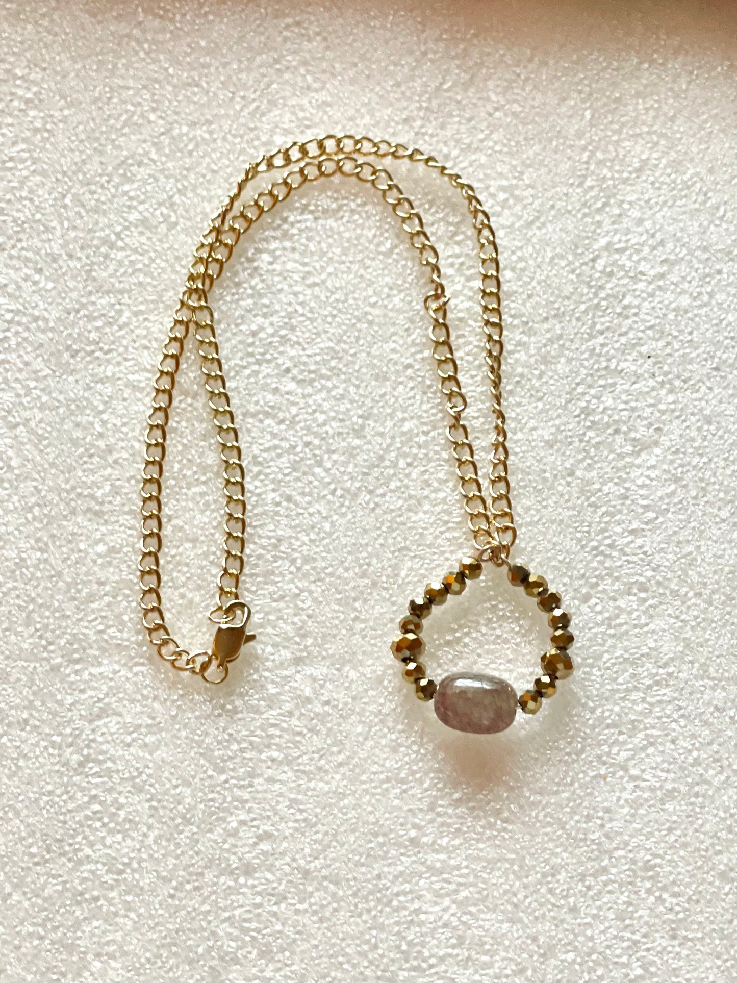 25 N16 Gold-tone faceted pendant necklace