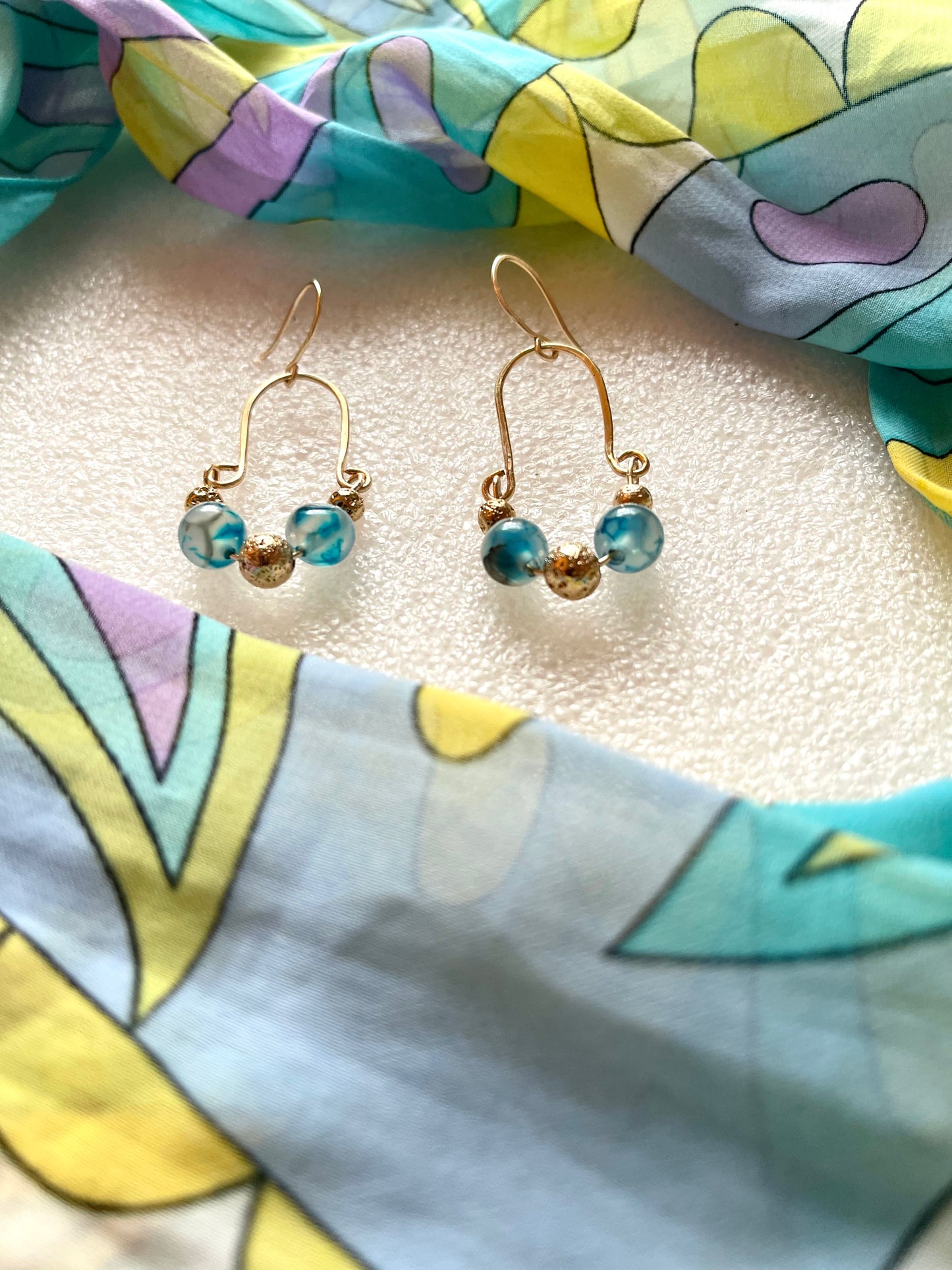 25 E21 Horseshoe shaped gold earrings