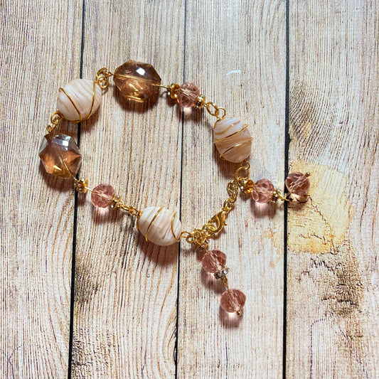 25 B26  Gold linked amber and peach faceted glass bracelet