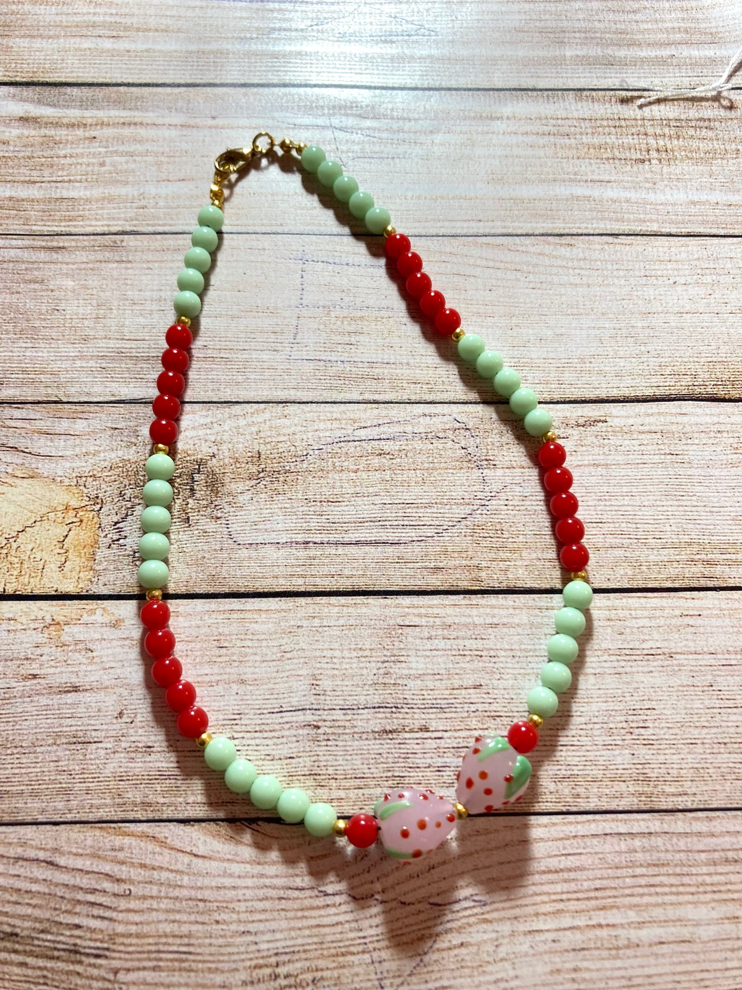 N24-C11 - Green & Red Beaded Necklace w/ Strawberry Focal