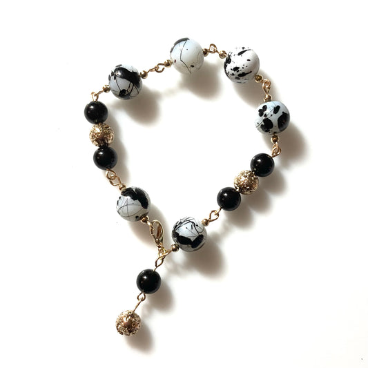 B24-F70C - Black, White and Gold Bracelet