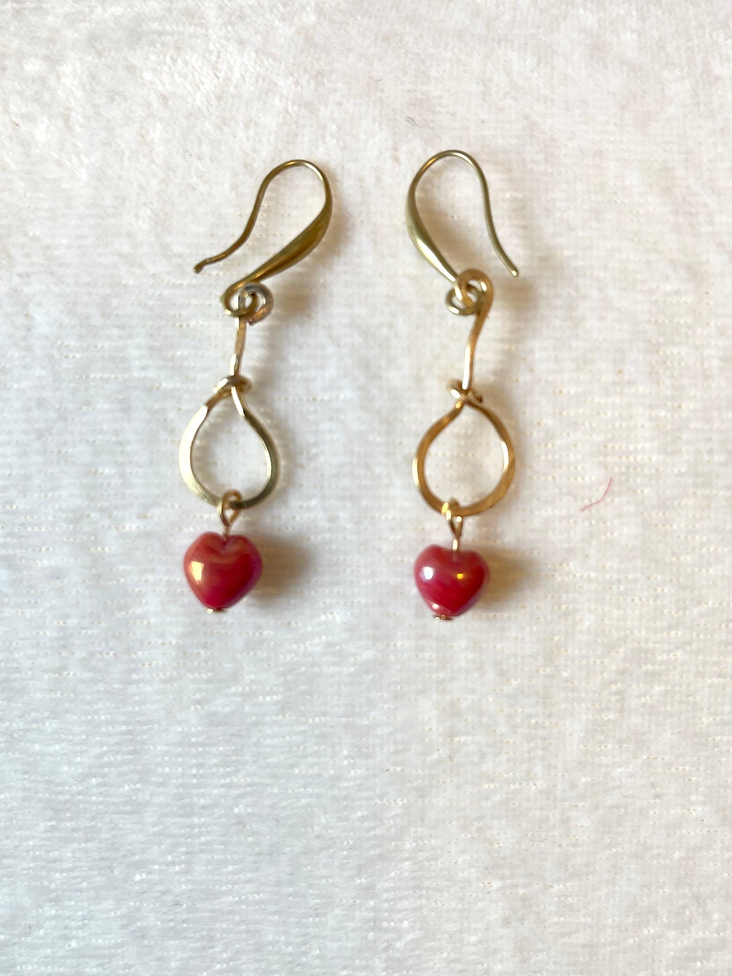 25 E18 Gold dangle earrings with red a heart