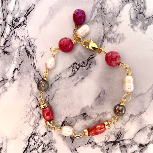 25 B27 Gold linked bracelet with beaded accents