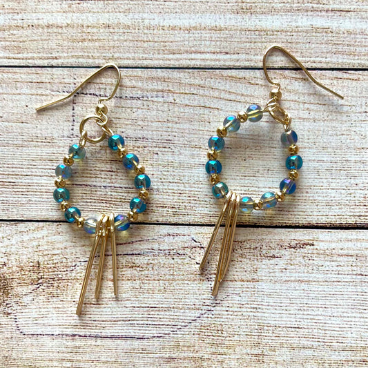 25 E26  Pretty sky blue beaded hoops with fringes