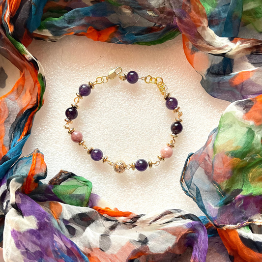 25 B24 Gold linked bracelet with amethyst