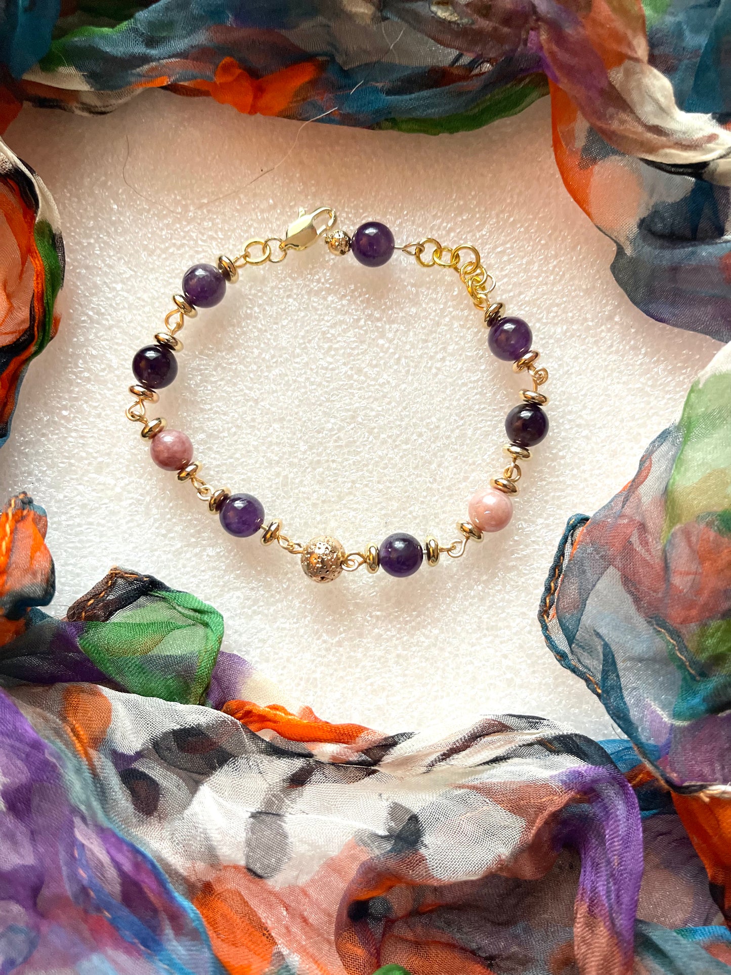 25 B24 Gold linked bracelet with amethyst