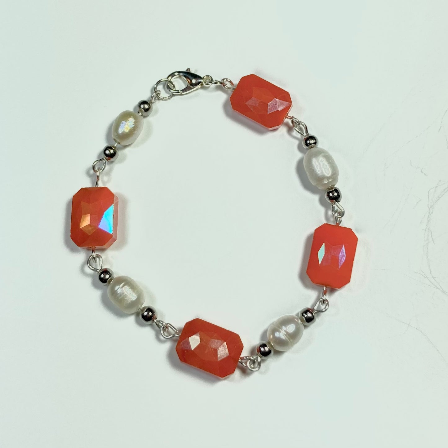 B24-43 - Orange & Freshwater Pearl Bracelet