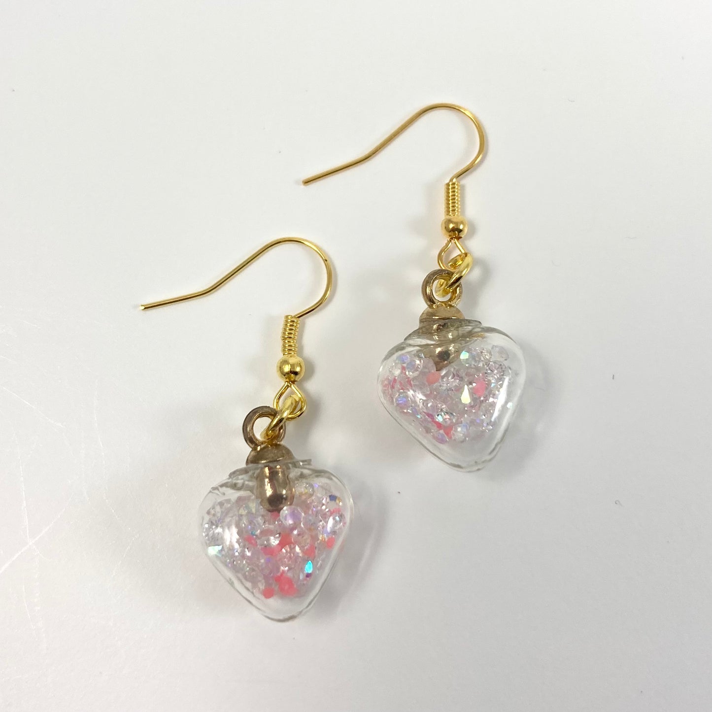 E24-FH2 - Glow in the Dark Pinkish Heart Earrings