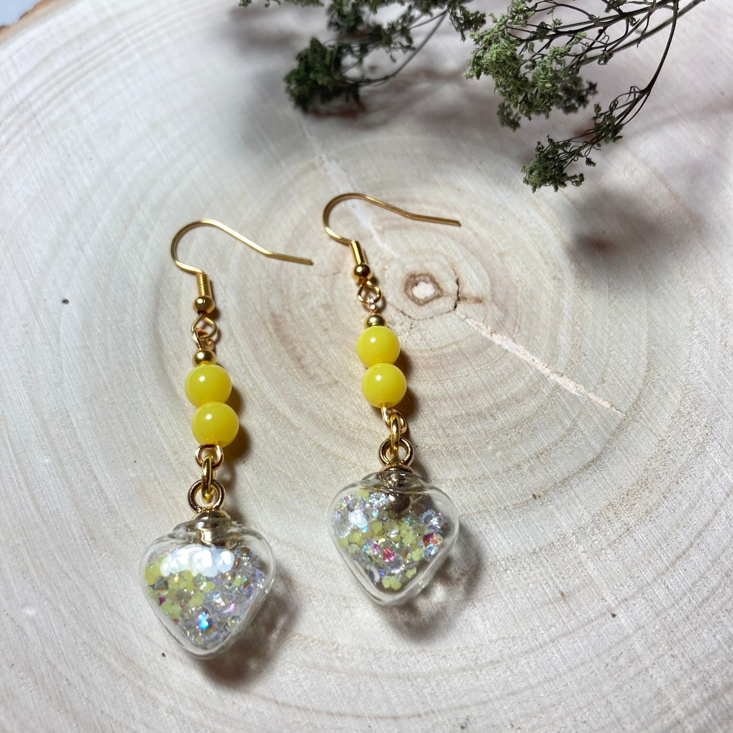 E24-FH6 - Clear & Yellow Glow in the Dark Heart Earrings